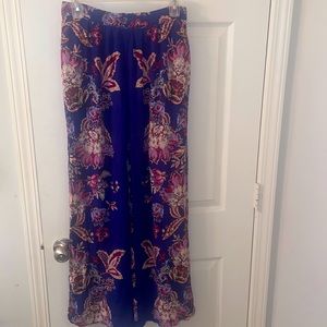 Floral wide- flared leg pants . Size M